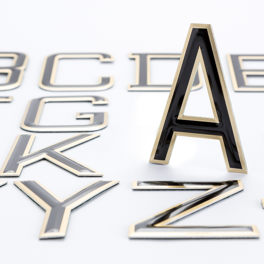 Embossed Gold-Black Letters